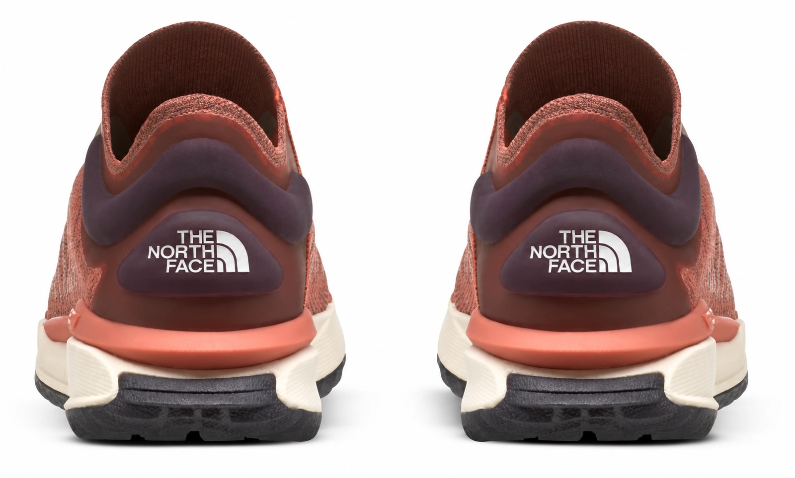 Rear view of the coral Escape Trail Knit pair.