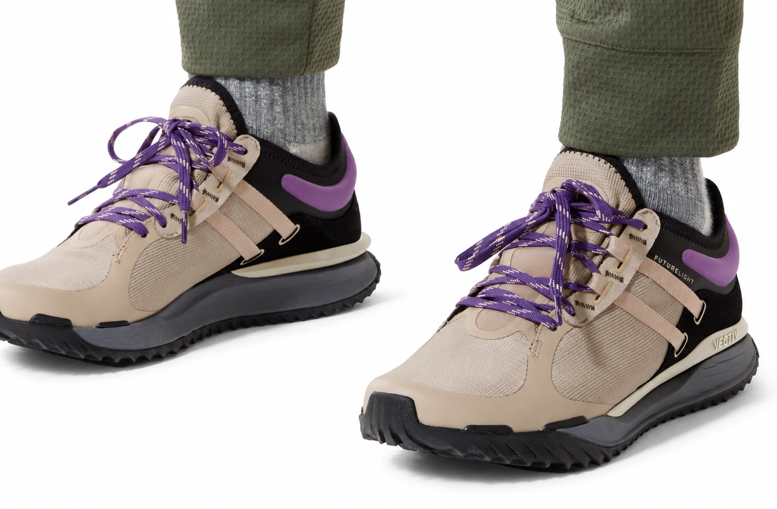 Escape Trail FUTURELIGHT in beige and purple, worn with olive trousers.