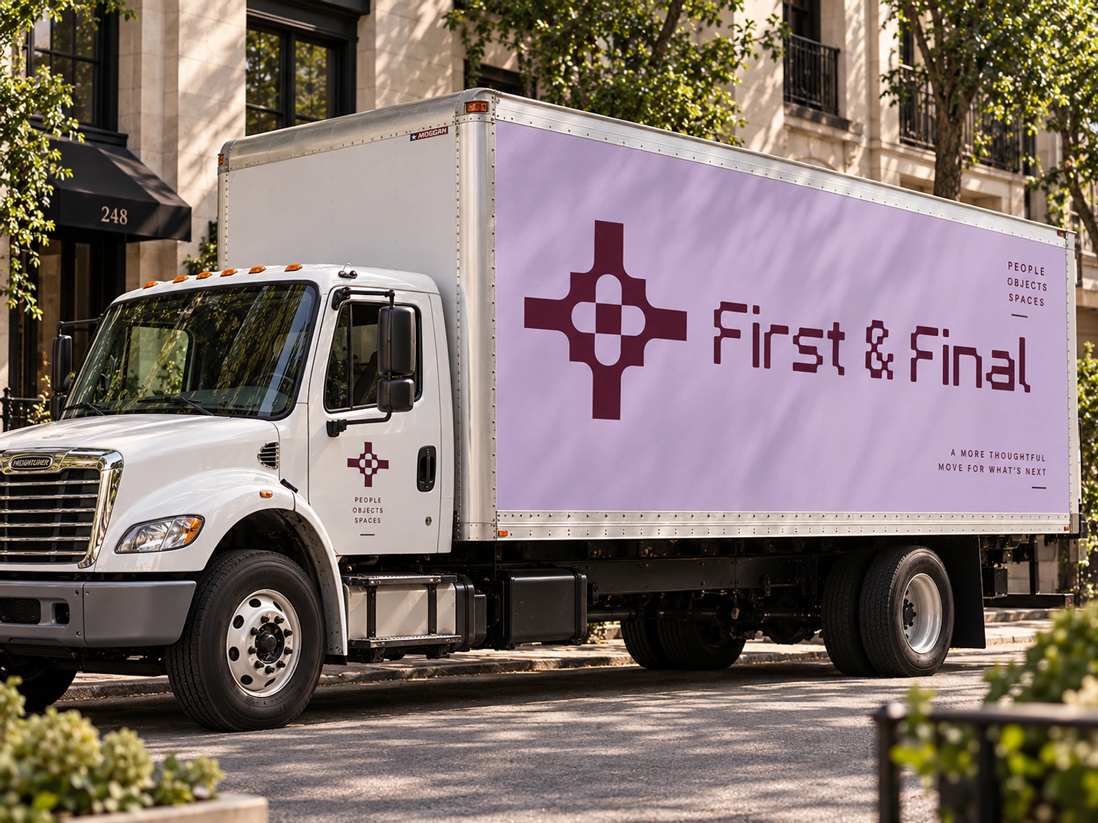 Signature truck livery with the oxblood symbol and First & Final wordmark on lavender