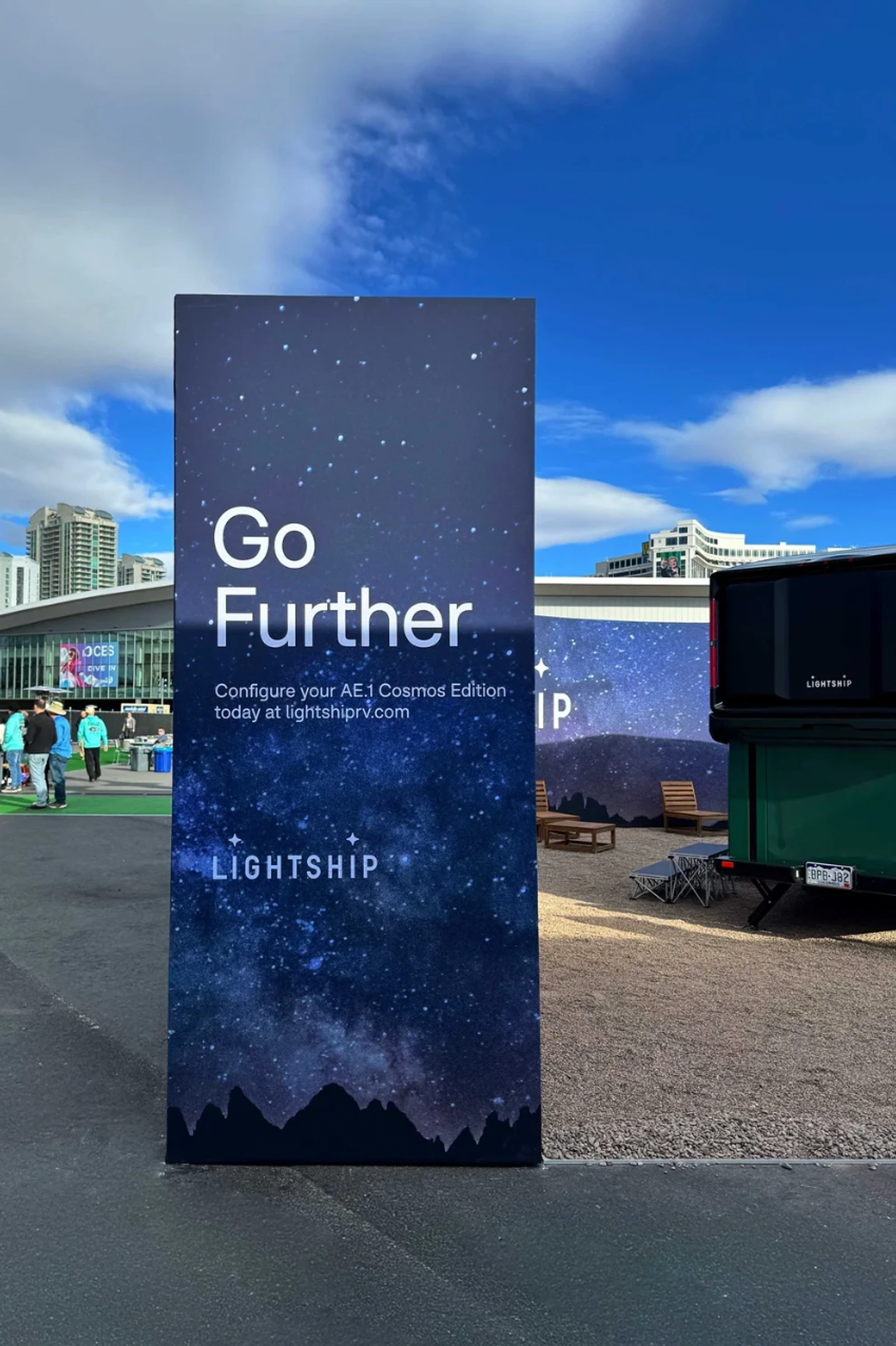 Vertical Lightship sign reading Go Further at the CES exhibit entrance.
