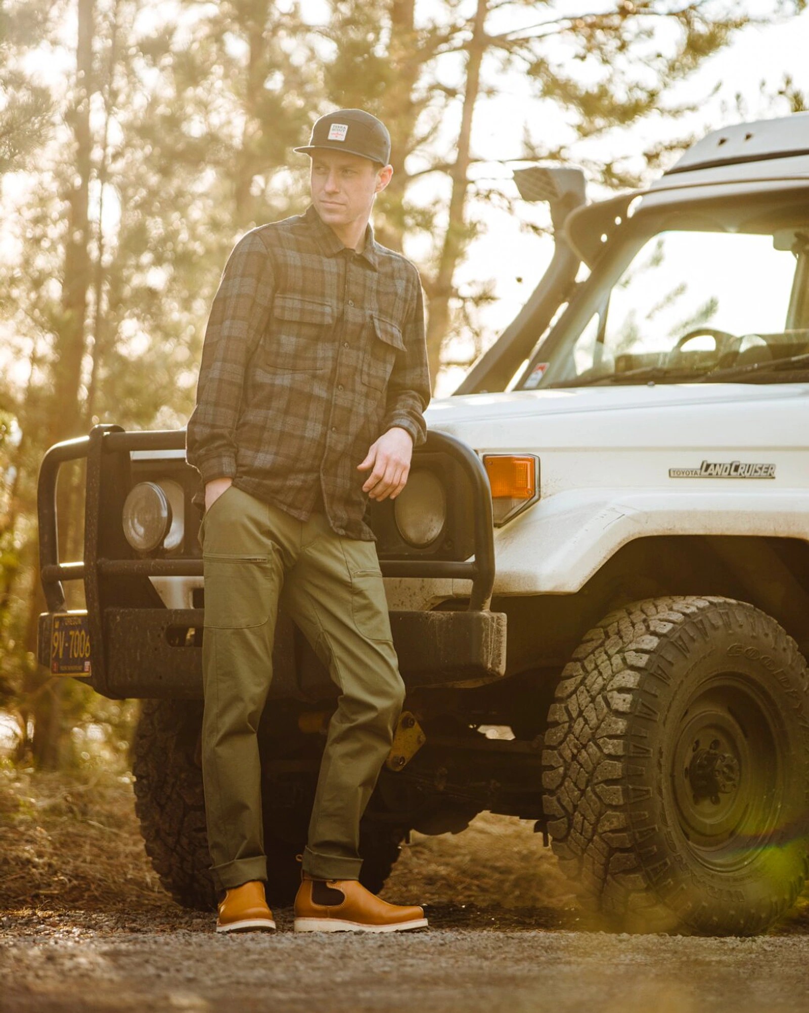 Terrascout apparel styled with a Land Cruiser in warm evening light.