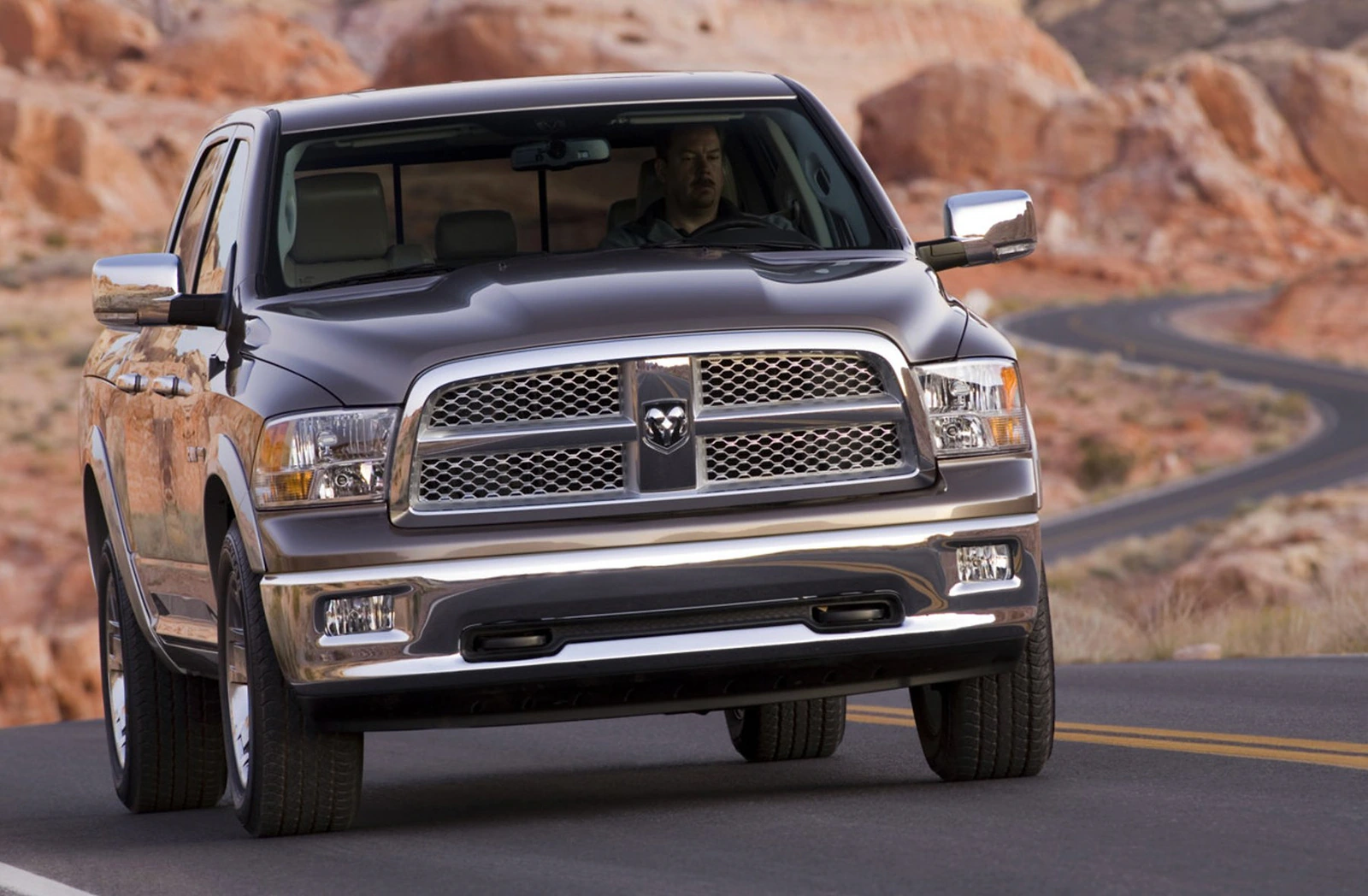 Front view of the 2009 Dodge Ram on a desert road.