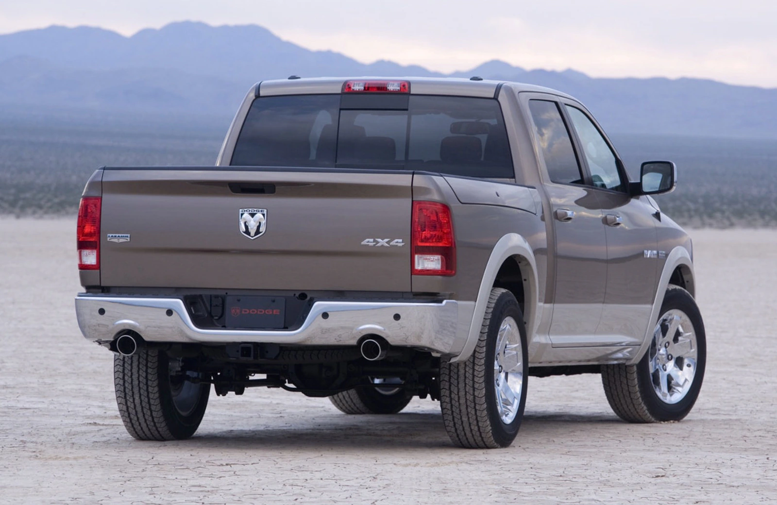 Rear three-quarter view of the 2009 Dodge Ram on a dry lake bed.